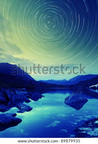 star circle over the mountain lake