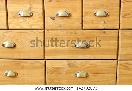old wooden  antique chest of drawers  with metal handles