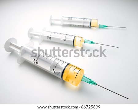 Syringes Over White Surface, For Medical,Healthcare Or Pharmacy Themes ...