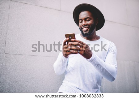 Similar – Image, Stock Photo Black stylish man in warm jacket on street