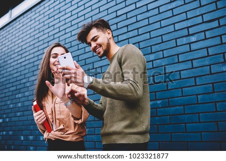 Similar – Image, Stock Photo Young hipster man browsing smartphone