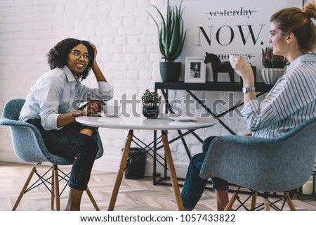 Similar – Image, Stock Photo Stylish black model talking on smartphone on gray background