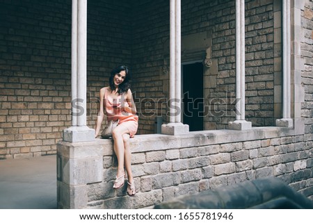 Similar – Image, Stock Photo Charming woman on stony coast