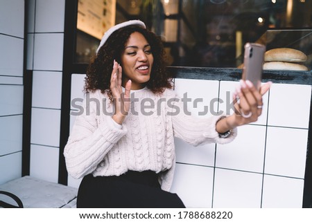 Similar – Image, Stock Photo Stylish black woman making a phone call on smartphone on the street