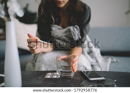 Similar – Image, Stock Photo Anonymous woman taking measurements in a wired dummy