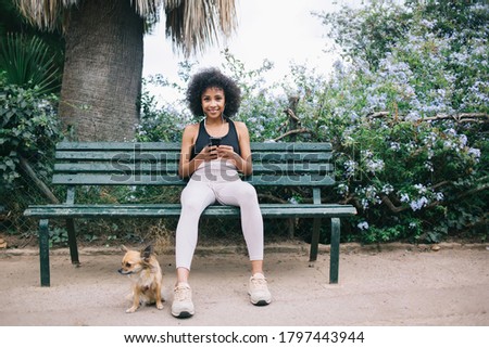 Similar – Image, Stock Photo Content ethnic sportswoman resting during training