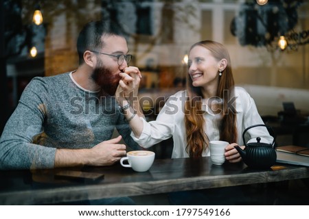 Similar – Image, Stock Photo Woman behind window in building near trees