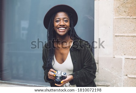 Similar – Foto Bild Positive schwarze Frau in der Nähe der blauen Wand