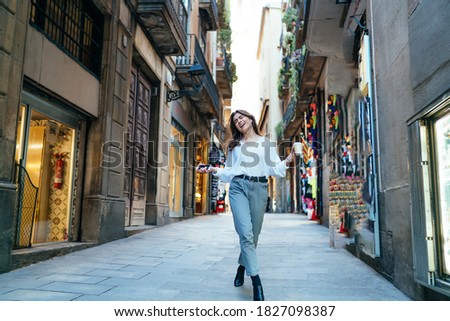 Similar – Image, Stock Photo Cheerful women dancing while listening to music