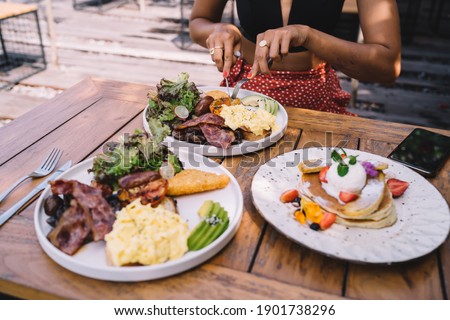 Similar – Foto Bild Anonyme Frau isst stilvolles Dessert mit Löffel