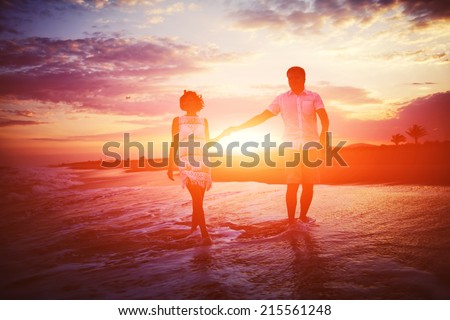 Love romance on travel honeymoon vacation summer holidays, honeymoon romantic couple in love walking on the beach, man and woman in romantic vacation