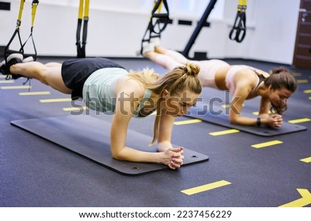 Similar – Image, Stock Photo Training with fitness straps outdoors.