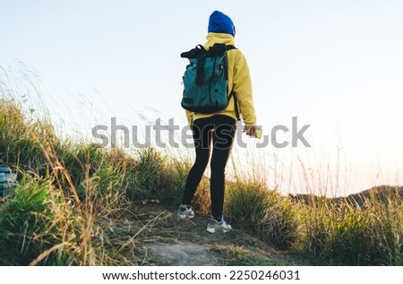 Similar – Image, Stock Photo Unrecognizable hiker observing wild valley from rocky cliff