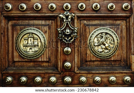 Ancient wooden door, old antique door lock, reinforced wooden door, wooden carving decorative panel for textural background