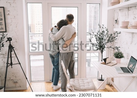 Similar – Image, Stock Photo Anonymous couple cuddling in apartment