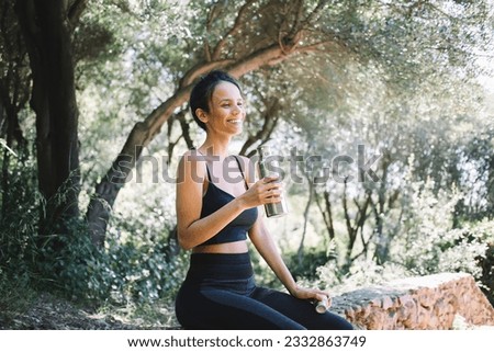 Similar – Image, Stock Photo Content ethnic sportswoman resting during training