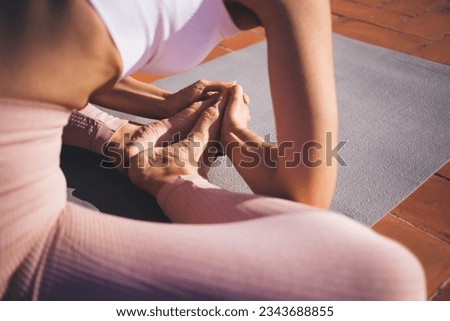 Similar – Image, Stock Photo Anonymous sportswoman practicing yoga on street