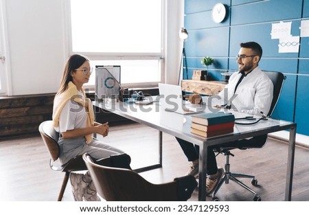 Similar – Image, Stock Photo Positive female patient sitting on bed in hospital