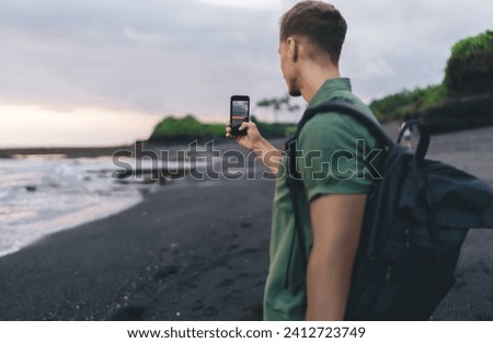 Similar – Image, Stock Photo Sunset sky over wavy sea with floating boats