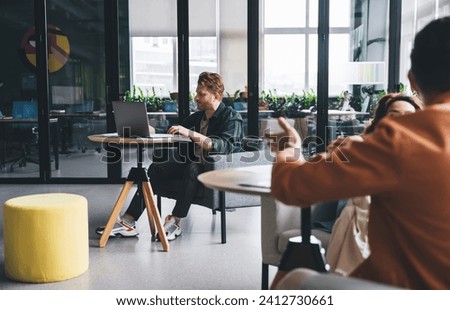 Similar – Image, Stock Photo Crop male entrepreneur browsing cellphone on street