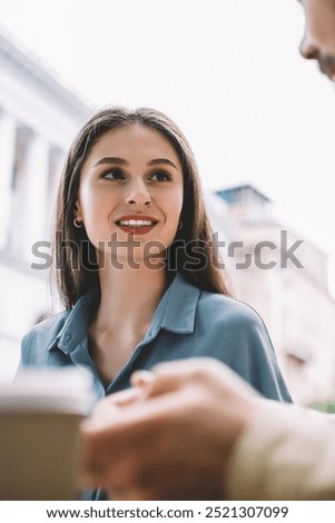 Similar – Image, Stock Photo Anonymous stylish focused man smoking cigarette near brick wall