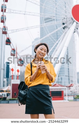 Similar – Image, Stock Photo Asian woman, posing near a tobacco drying shed, wearing a white dress and green wellies.