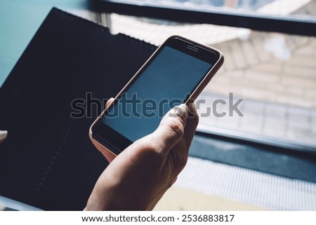 Similar – Image, Stock Photo Anonymous black businesswoman using smartphone at home