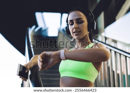 Similar – Image, Stock Photo Slim sportswoman standing near building on street