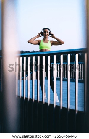 Similar – Image, Stock Photo Slim sportswoman standing near building on street