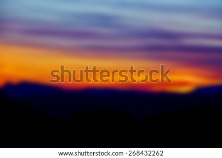 Purple sunset over mountain hills landscape special blur effect for text, copy space area