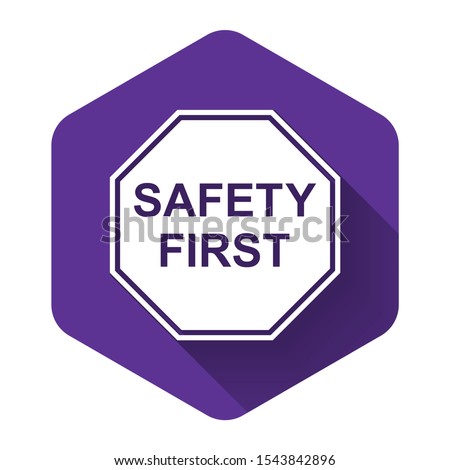 White Safety First octagonal shape icon isolated with long shadow. Purple hexagon button. Vector Illustration