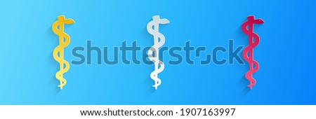 Paper cut Rod of asclepius snake coiled up silhouette icon isolated on blue background. Emblem for drugstore or medicine, pharmacy snake symbol. Paper art style. Vector.