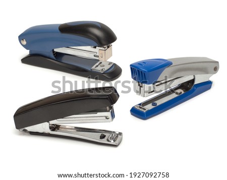 Top view of three staplers isolated on a white background. Photo stock © 