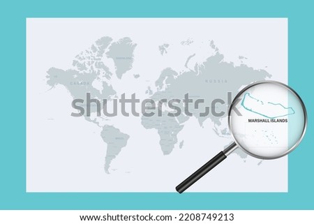Map of Marshall Islands on political world map with magnifying glass