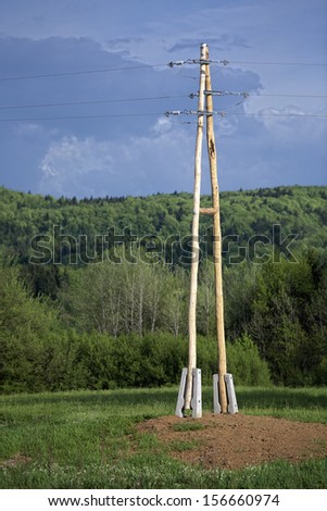 New Power Line Pole. New wooden pole was installed during maintenance works on power line.