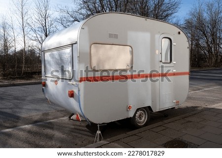 Similar – Image, Stock Photo A old camper with a fancy curtain