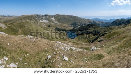 Similar – Image, Stock Photo 1600 | Mountain lake with clouds hanging low in the mountain