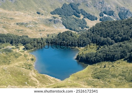 Similar – Image, Stock Photo 1600 | Mountain lake with clouds hanging low in the mountain