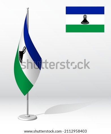 LESOTHO flag on flagpole for registration of solemn event, meeting foreign guests. National independence day of LESOTHO. Realistic 3D vector on white