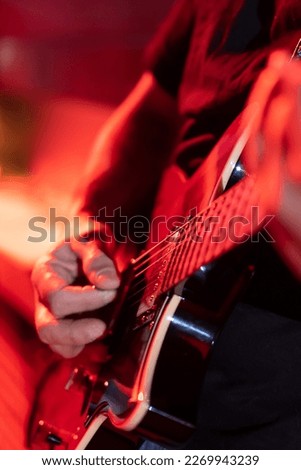 Similar – Image, Stock Photo Guitarist playing outdoors