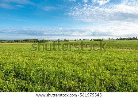 Similar – Image, Stock Photo Summer landscape with fields, meadows, lake and mountains. Road on the lakeside