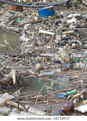 Plastic trash floating in water