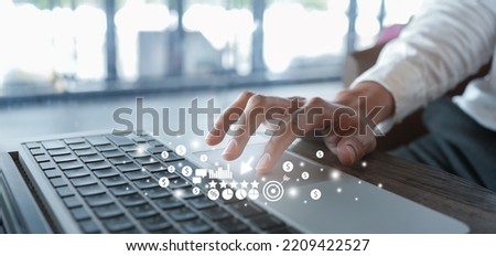 close up businessman hand touch screen on digital tablet to use marketing tool and check traffic research of pay per click program on web page for online b2b business and lifestyle concept Zdjęcia stock © 