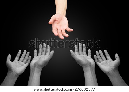 helping hand and hands praying on  black background , helping hand concept.
