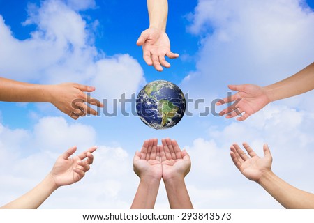 multiple hands reaching the world for heal together, save the world concept ,Elements of this image furnished by NASA
