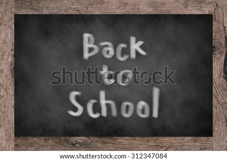 chalk board background textures with message Back to school and old vintage wooden frame ,blackboard concept,back to school concept.education concept.