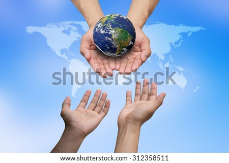 hands reaching the world for heal together, save the world concept ,Elements of this image furnished by NASA.