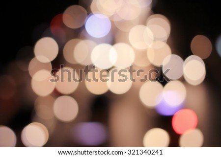 Abstract blurred colorful of traffic circle light backgrounds : blurred night city with color bokeh light :blurred backdrop concept:blur background in vintage tone colored :out of focused concept
