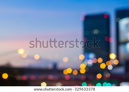 Abstract blurred night city background with circle light. blur backgrounds concept:blur of cityspace in sunset hour wallpaper concept:blurry night urban backdrop.blurred city