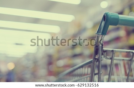 Similar – Image, Stock Photo Blurred  Supermarket with empty shopping cart